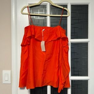 Cos. Orange top.